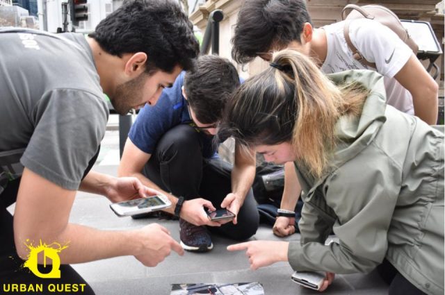 team engaged in problem solving team building activities melbourne